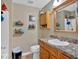 Bathroom featuring a single sink vanity and a shower with essential supplies at 161 Gann Cemetery Rd, Dallas, GA 30157