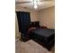 Bedroom featuring a dark-colored bed frame with neutral walls, carpet, and ceiling fan at 161 Gann Cemetery Rd, Dallas, GA 30157