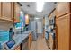 Functional kitchen featuring wood cabinets, stainless steel appliances, and ample counter space at 161 Gann Cemetery Rd, Dallas, GA 30157