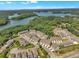 Aerial view of a waterfront community with lush green surroundings and stunning lake views at 1610 Habersham Villa Dr, Cumming, GA 30041