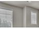 Bedroom with blinds and view from the window at 1610 Habersham Villa Dr, Cumming, GA 30041