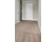 Spacious bedroom with neutral walls and carpet flooring, offering a bright and comfortable living space at 1610 Habersham Villa Dr, Cumming, GA 30041