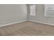 Empty bedroom with neutral carpet, two windows and blinds at 1610 Habersham Villa Dr, Cumming, GA 30041