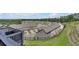 Scenic view of the community's townhomes nestled in a landscape with fenced yards at 1610 Habersham Villa Dr, Cumming, GA 30041