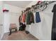 Spacious walk-in closet equipped with ample hanging storage and shelving at 3040 Clear View Ln, Snellville, GA 30078