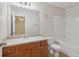 Bathroom featuring a large vanity, bright lighting, and a tub/shower combination creating a relaxing space at 755 Magnolia Gardens Walk, Mcdonough, GA 30253