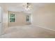 A view of a spacious bedroom with two windows providing lots of light and open space at 755 Magnolia Gardens Walk, Mcdonough, GA 30253