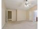Spacious bedroom with vaulted ceilings, neutral tones, and an ensuite bathroom creating a relaxing retreat at 755 Magnolia Gardens Walk, Mcdonough, GA 30253