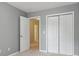 Bedroom with a closet and view of a hallway at 755 Magnolia Gardens Walk, Mcdonough, GA 30253