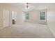 Spacious bedroom with two large windows and ensuite bathroom access providing a peaceful retreat at 755 Magnolia Gardens Walk, Mcdonough, GA 30253