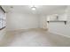 Bright and open living room with a breakfast bar pass through to the kitchen at 755 Magnolia Gardens Walk, Mcdonough, GA 30253