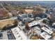 Aerial view of neighborhood with homes, businesses, streets, parking and colorful foliage during the autumn season at 93 Terry St # A, Atlanta, GA 30312