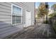 Backyard deck with wood privacy fence and gray siding creating a cozy outdoor space at 93 Terry St # A, Atlanta, GA 30312