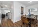 Bright dining room adjacent to the kitchen with wood floors at 93 Terry St # A, Atlanta, GA 30312