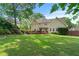 Spacious backyard with lawn and deck at 1775 Potomac Ct, Lawrenceville, GA 30043