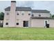 Backyard offers a lawn, a back door and sliding glass doors at 3703 Liberty Sw Dr, Powder Springs, GA 30127