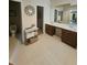 Elegant bathroom with double sink vanity, ample storage, and tiled floors at 3703 Liberty Sw Dr, Powder Springs, GA 30127