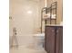 Functional bathroom with a stand-up shower, providing essential amenities in a compact space at 3703 Liberty Sw Dr, Powder Springs, GA 30127