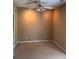 Neutral bedroom offers standard ceiling fan and neutral carpet at 3703 Liberty Sw Dr, Powder Springs, GA 30127