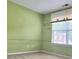 Inviting bedroom with cheerful wall art and a large window, creating a cozy space at 3703 Liberty Sw Dr, Powder Springs, GA 30127