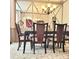 Elegant dining room with chandelier, mirrored wall, and stylish wood chairs ideal for Gathering gatherings at 3703 Liberty Sw Dr, Powder Springs, GA 30127