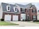 Attractive two-story brick home with a two car garage and well manicured lawn at 3703 Liberty Sw Dr, Powder Springs, GA 30127