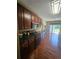 Modern kitchen with stainless steel appliances, dark countertops and ample cabinet space at 3703 Liberty Sw Dr, Powder Springs, GA 30127