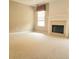 Spacious living room with a cozy fireplace and plenty of natural light, perfect for Gathering gatherings at 3703 Liberty Sw Dr, Powder Springs, GA 30127