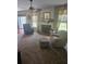 Inviting living room with a fireplace, ceiling fan, neutral carpet and comfortable seating at 3703 Liberty Sw Dr, Powder Springs, GA 30127