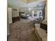Spacious main bedroom with tray ceiling, sitting area, and natural light at 3703 Liberty Sw Dr, Powder Springs, GA 30127