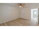 Bedroom featuring wood-look floors and an opened doorway at 7020 Camp Valley Rd, Riverdale, GA 30296
