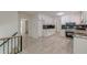 Open kitchen view with stainless steel appliances, white cabinetry, and modern countertops at 7020 Camp Valley Rd, Riverdale, GA 30296