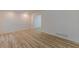 View of the spacious living room with beautiful flooring at 7020 Camp Valley Rd, Riverdale, GA 30296