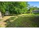 A backyard featuring a storage shed and lush green grass at 958 Crew Sw St, Atlanta, GA 30315