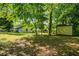 The backyard features plenty of green space and a storage shed at 958 Crew Sw St, Atlanta, GA 30315