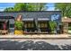 Exterior of Talat Market on a sunny day with some seating at 958 Crew Sw St, Atlanta, GA 30315