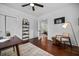 Stylish home office features a wooden desk, bookshelf, and hardwood floors at 958 Crew Sw St, Atlanta, GA 30315