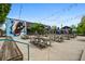 Large patio with picnic tables and a mural at 958 Crew Sw St, Atlanta, GA 30315