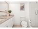 Bathroom with shower, toilet, vanity, and neutral color scheme and tile flooring at 11190 Serenbe Ln, Chattahoochee Hills, GA 30268