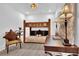 Bedroom featuring hardwood floors, a bunk bed, a work desk, and neutral wall paint at 11190 Serenbe Ln, Chattahoochee Hills, GA 30268