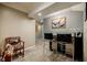 Finished basement featuring a modern wet bar with seating and cabinet at 3389 Robinson Farms Ne Trce, Marietta, GA 30068