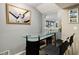 Finished basement featuring a modern wet bar with seating and bar cabinet at 3389 Robinson Farms Ne Trce, Marietta, GA 30068