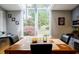 Bright breakfast nook features large windows offering serene backyard views at 3389 Robinson Farms Ne Trce, Marietta, GA 30068