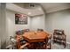 Game room features a wooden poker table with seating and carpet flooring at 3389 Robinson Farms Ne Trce, Marietta, GA 30068