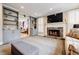 Inviting living room with fireplace, built-in bookshelves, and neutral carpeting at 3389 Robinson Farms Ne Trce, Marietta, GA 30068