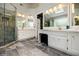 The main bathroom features a large stand-up shower and double sinks with marble countertops at 3389 Robinson Farms Ne Trce, Marietta, GA 30068
