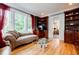 Cozy office space with custom bookshelves, large windows, and natural light at 3389 Robinson Farms Ne Trce, Marietta, GA 30068