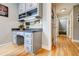 Office nook features a built-in desk with granite countertop and overhead storage at 3389 Robinson Farms Ne Trce, Marietta, GA 30068