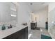 Bright bathroom featuring a large vanity with double sinks and a tile floor at 510 Boulder View Parkway, Dallas, GA 30157