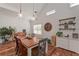 Dining room features a wood table, stylish chairs, and decorative shelving for a warm atmosphere at 510 Boulder View Parkway, Dallas, GA 30157